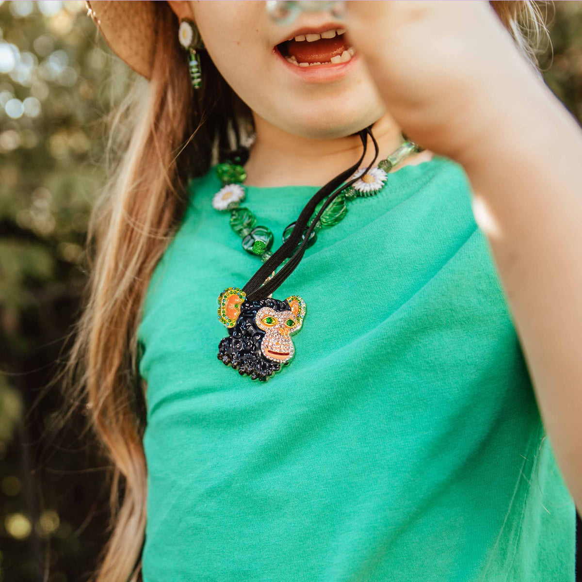 Jungle Gems necklace girl with hat