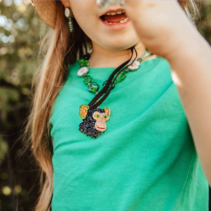 Jungle Gems necklace girl with hat